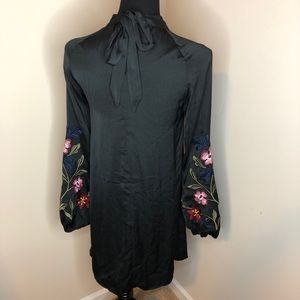 Black dress with floral embellishments